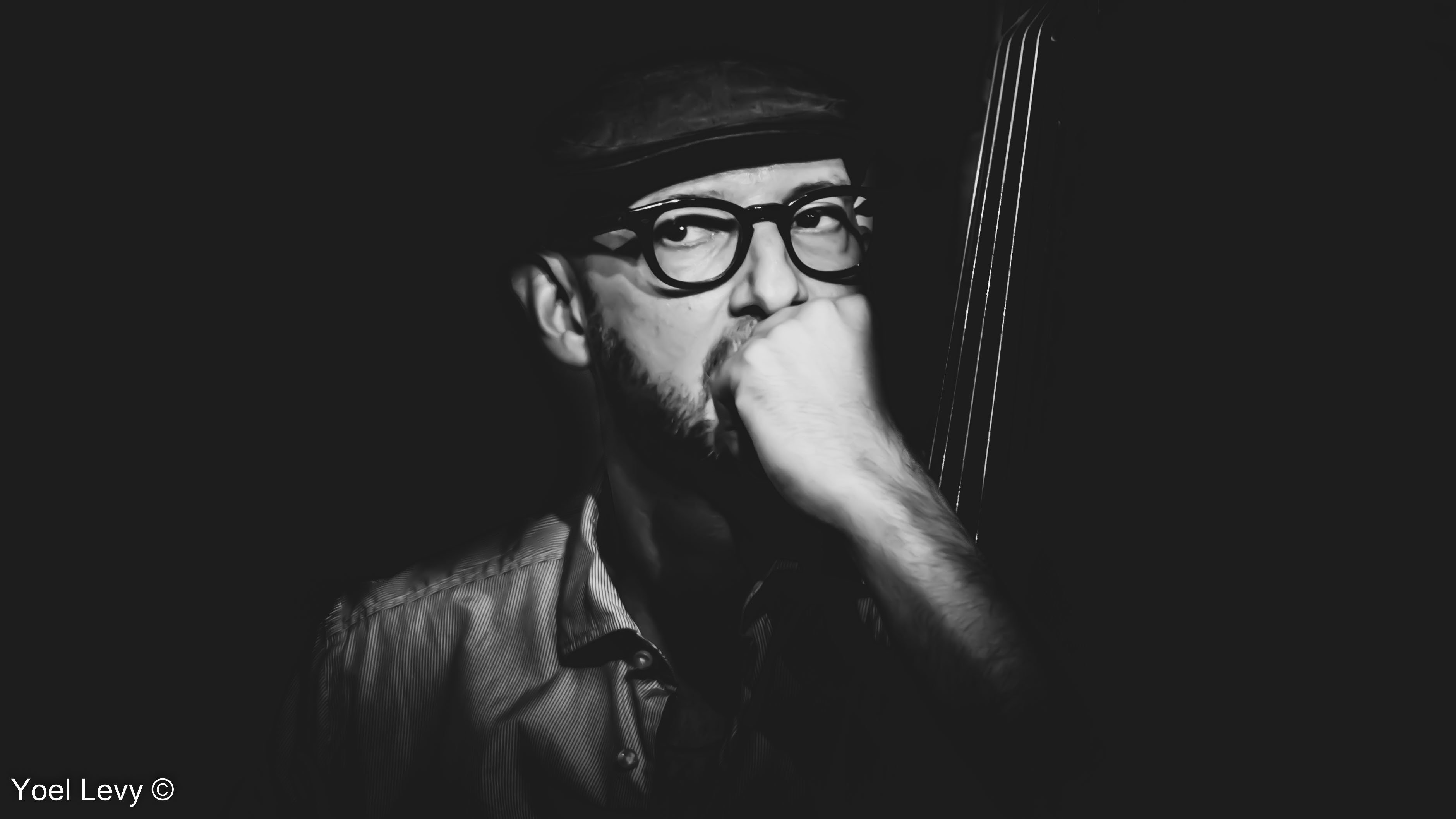 Barak Mori portrait with bass - Photo by Yoel Levy
